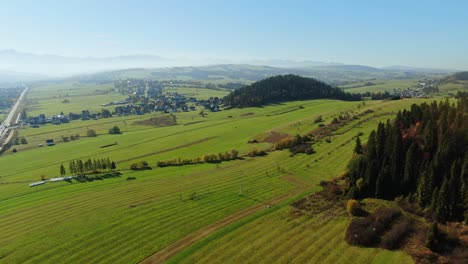 Aerial-panorama-of-scenic-pastures-by-Zakopianka-highway,-Poland