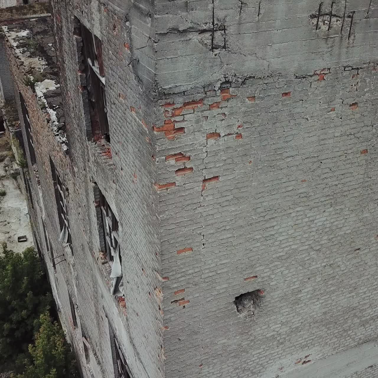 Ruins of an old factory. Old industrial building for demolition. Aerial view