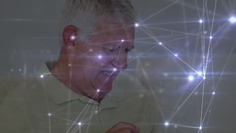 animation of connections over happy caucasian senior man