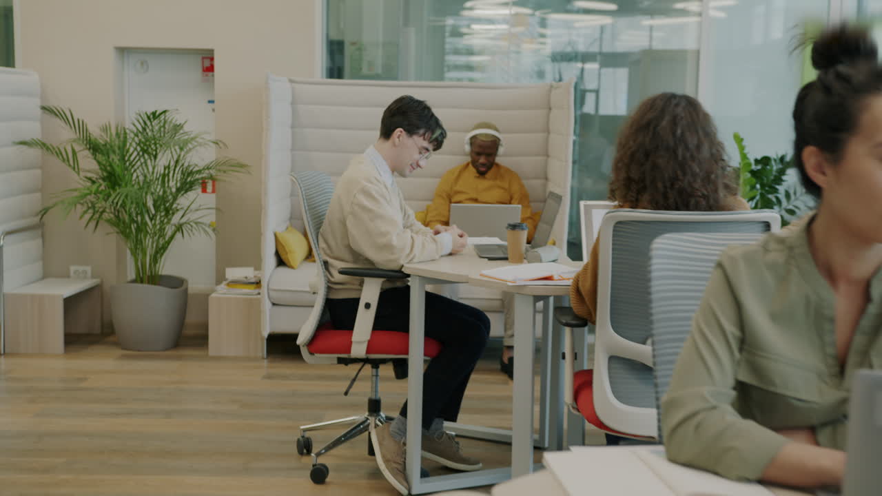 Modern Office Coworking Space with Diverse Team