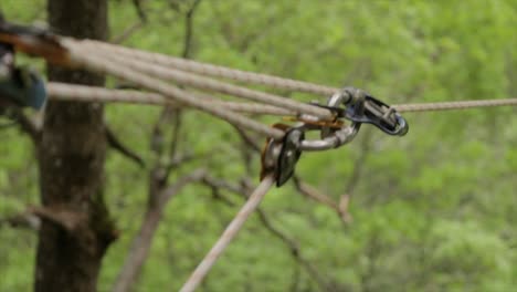 ropes of a zip line being secured