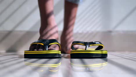 young men feet wearing sandal