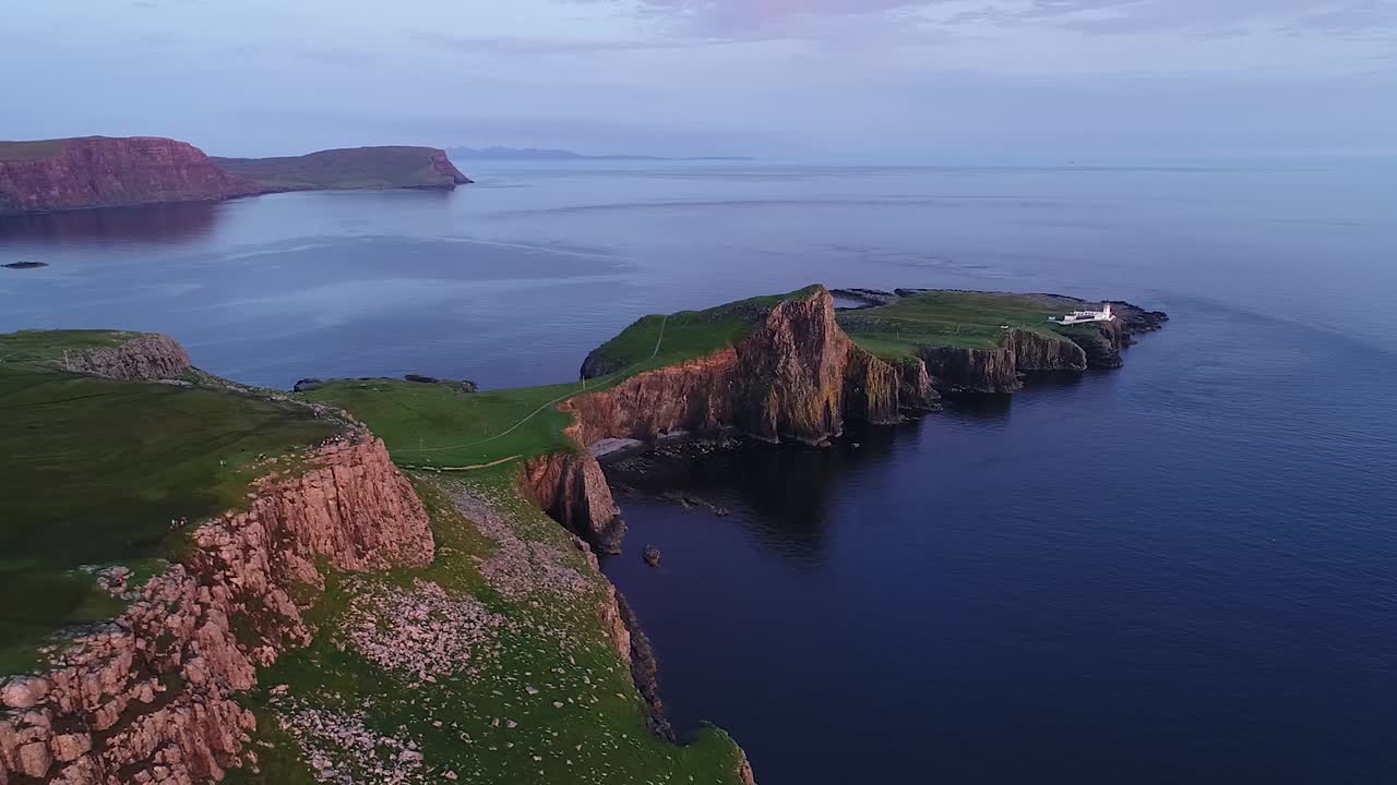 The neist point lighthouse seen from the drone at sunset. The viewpoint is located west of scotland