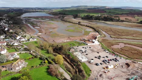 aerial flying over car park beside otter estuary nature reserve in budleigh salterton