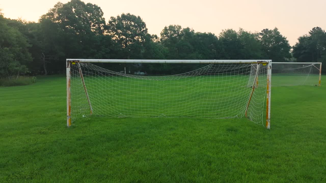 Leftward motion viewing a rusty soccer net