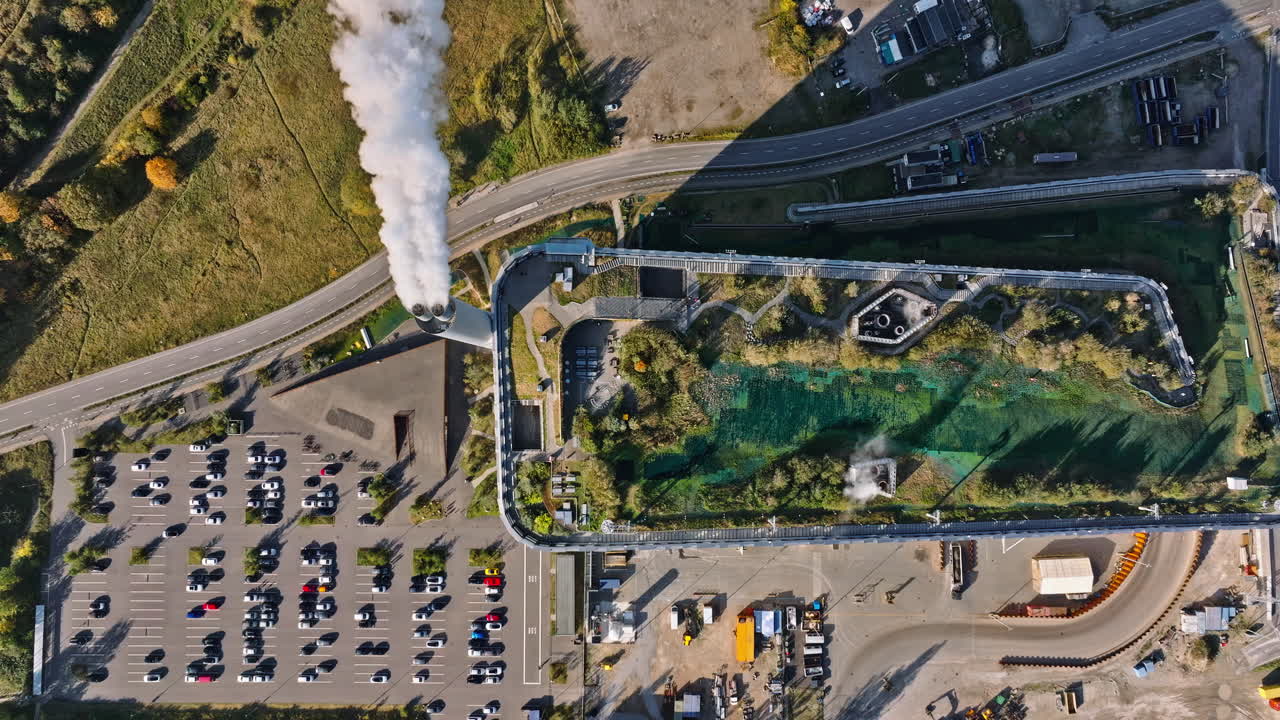 Aerial drone view of CopenHill artificial ski slope on the roof of an energy plant