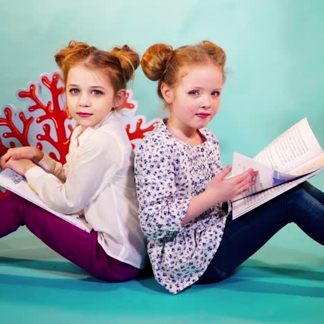 happy kids reading books together after school