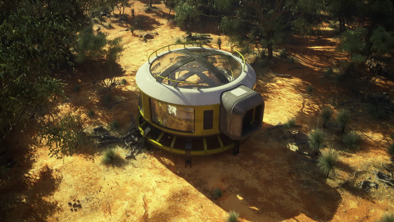 Unique circular dwelling surrounded by desert landscape in bright sunlight