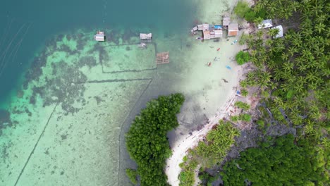 aerial top down perspective of timbayan rock walls of balabac island by village