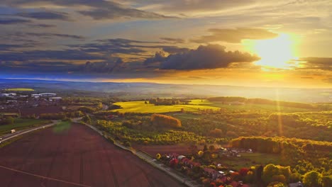 beautiful cinematic aerial drone shot of golden hour sun over barnsley, yorkshire