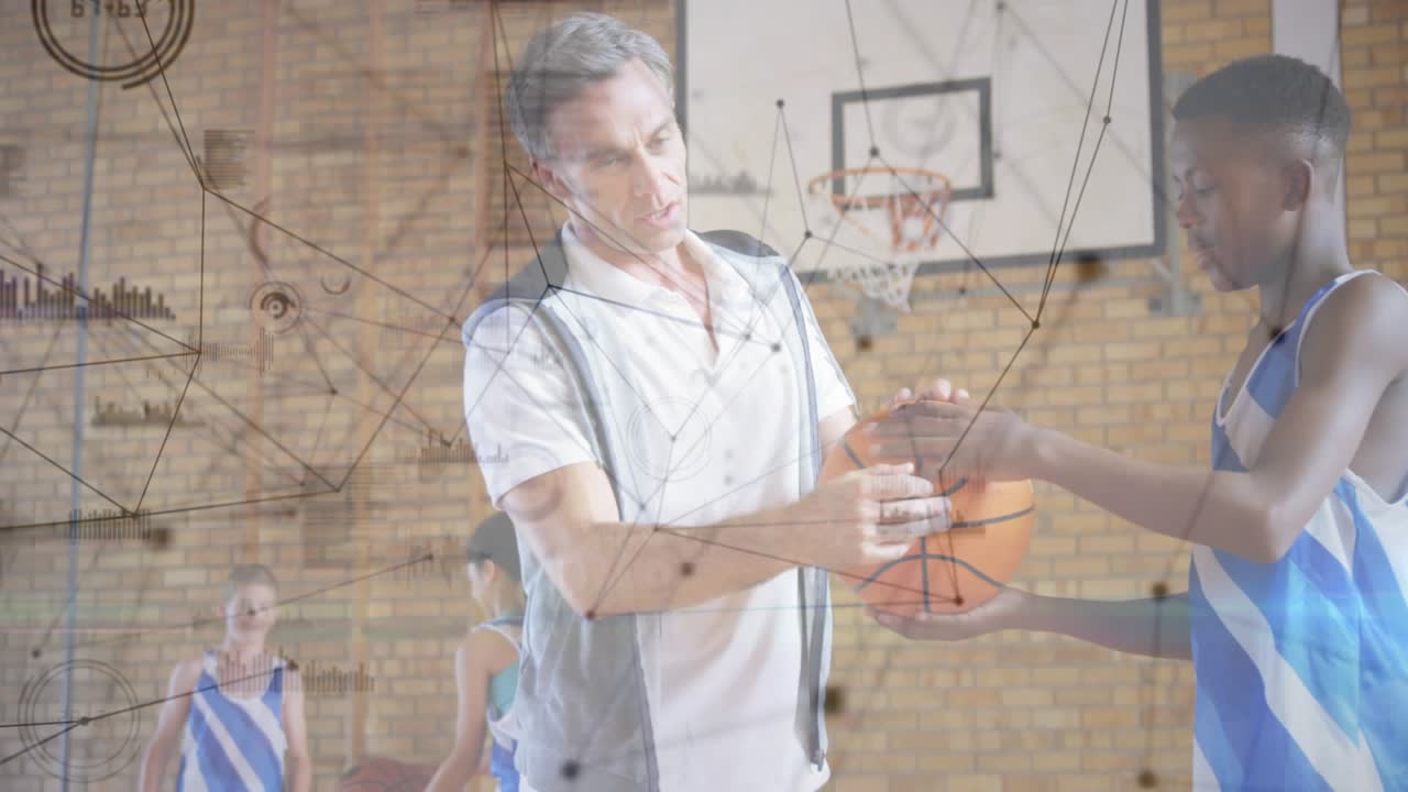 Coach reaching and guiding trainee's basketball grip on court, overlay nodes showing grip training