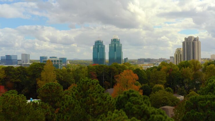 Aerial shot slowly flying towards the King and Queen building in Atlanta Georgia