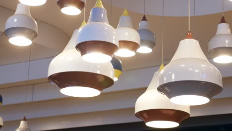 modern pendant lights hanging from a ceiling