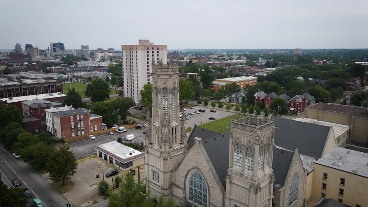 Experience the timeless beauty of an old church in downtown Louisville through a captivating drone shot that captures its historic charm