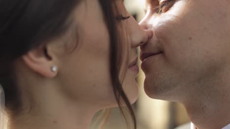 Portrait-of-lovely-newlyweds-caucasian-bride-embracing-groom,-wedding-couple-family-hugging