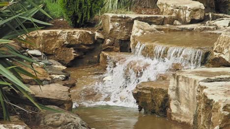 serene waterfall in a garden setting