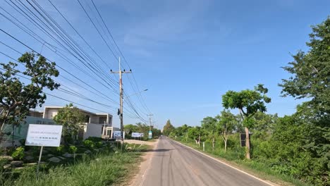 progression along a sunny suburban street