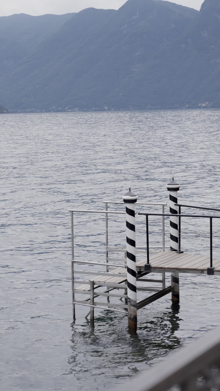 Lake Pier with Striped Poles