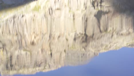 reflection of mountain in the water
