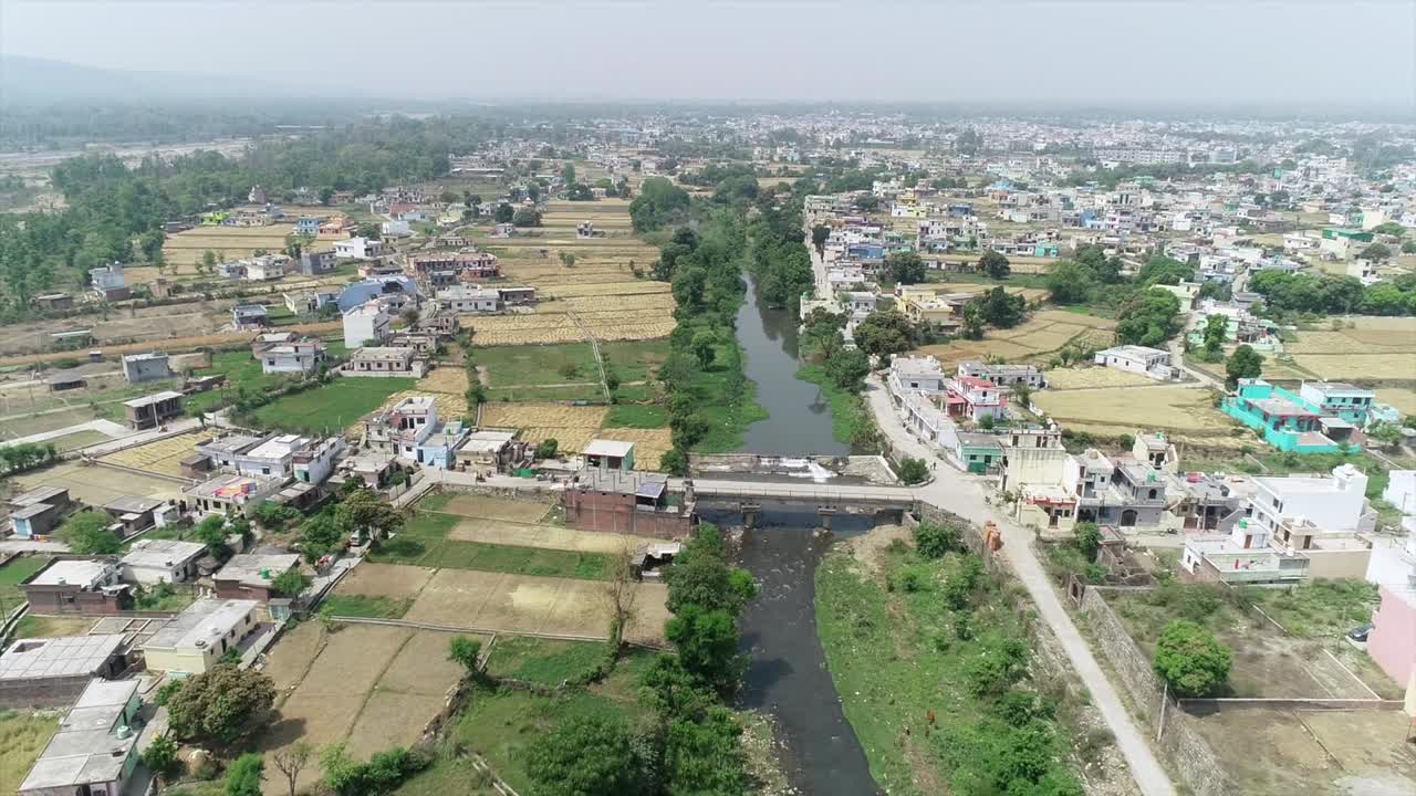 drone shoot in Dehradun Uttarakhand , rural India aerial view footage for fee stocks Clip