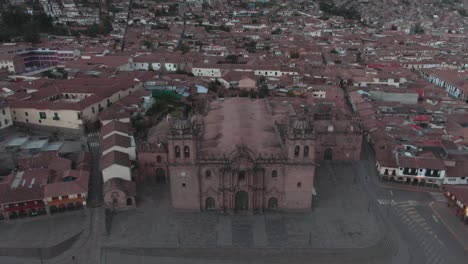 4k daytime aerial drone footage over the main cathedral from plaza de armas in cusco, peru during coronavirus lockdown