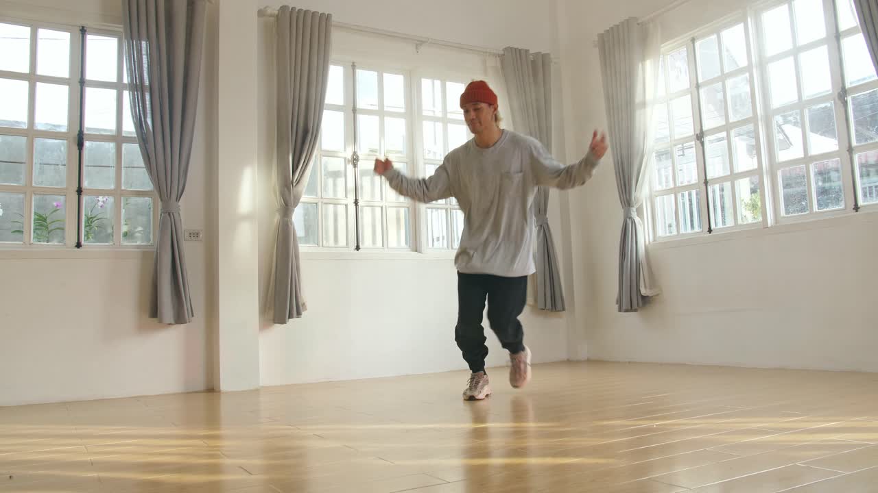 Breakdancing in a bright studio