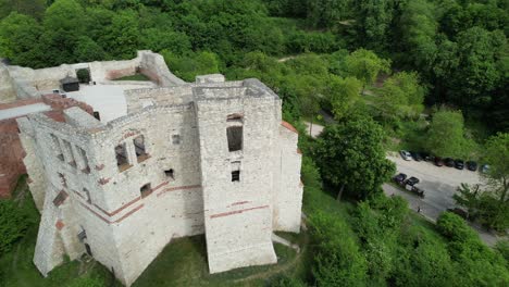panorama of ruins of a romanesque castle in kazimierz dolny city. aerial view.