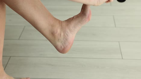a person putting on socks