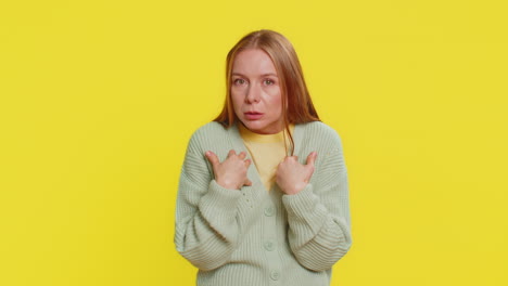 caucasian woman with curly hair pointing fingers herself feels innocent not her fault fail mistake