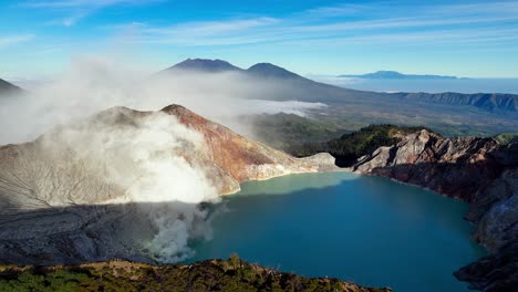 aerial view of kawah ijen volcano and the rising sulfurous fumes in the caldera