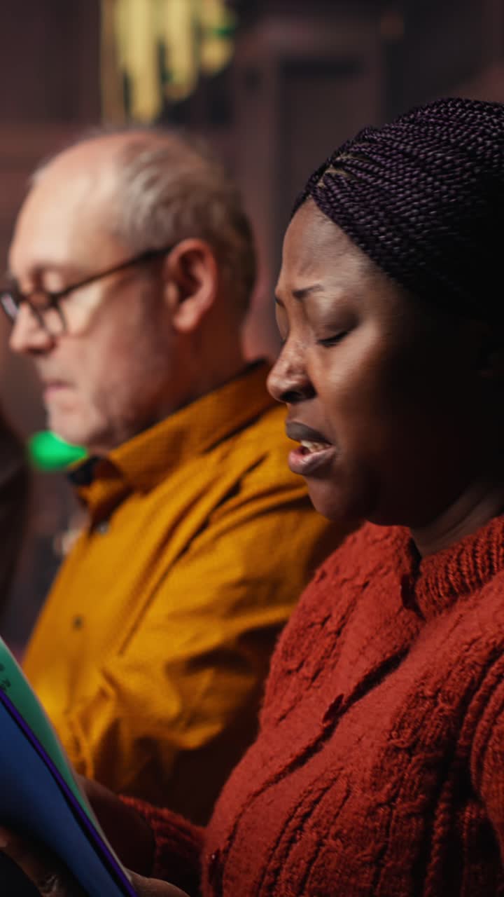 Vertical Video African american woman asking people for silence in a public library