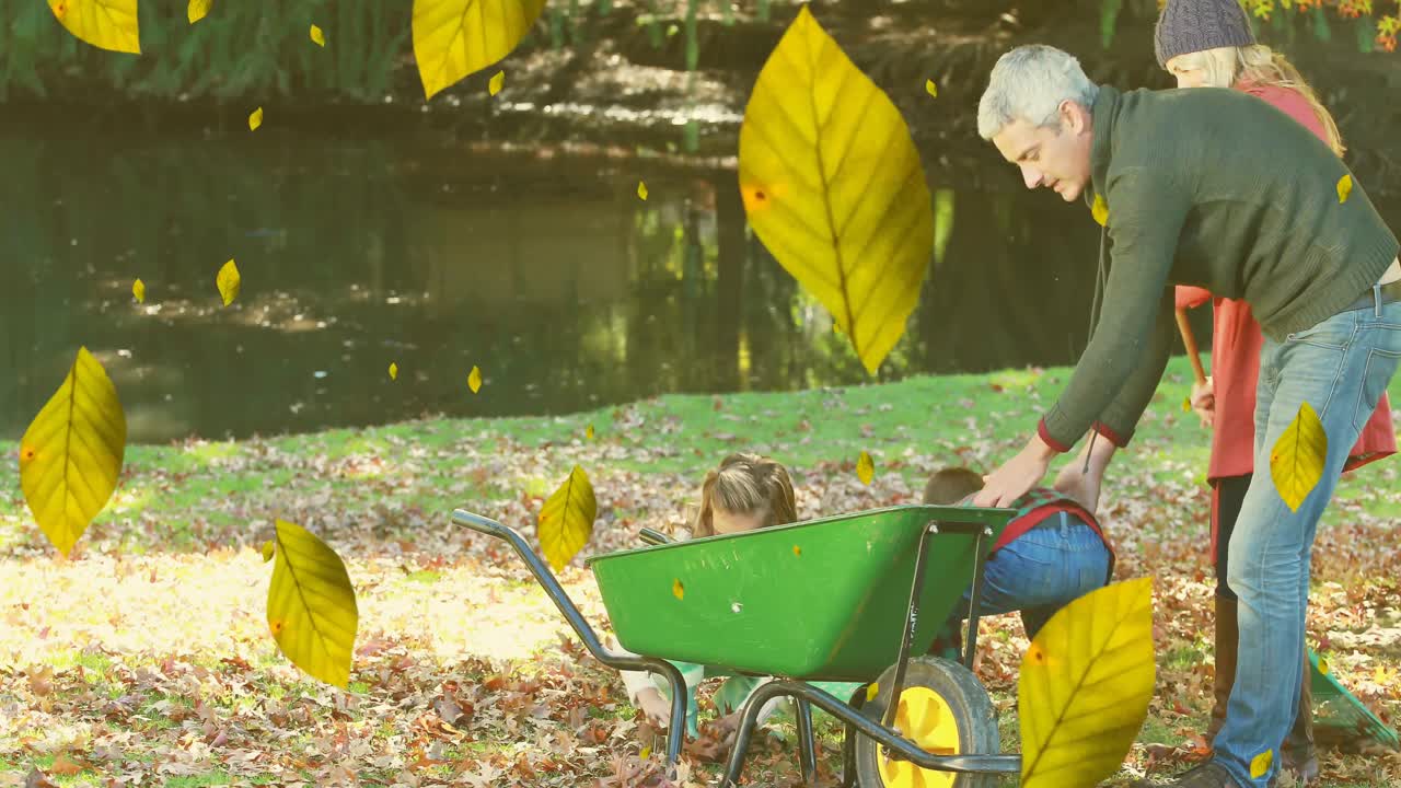 공원에서 잎을 모으는 코카서스 가족 위에 떨어지는 가을 잎의 애니메이션