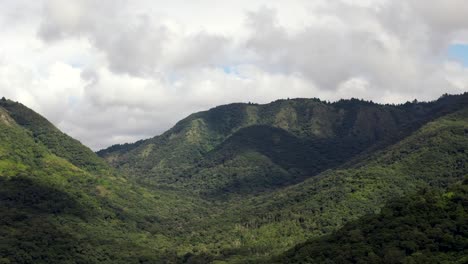 Bird's-eye-view-of-the-convergence-of-jungle,-mountains,-and-air-in-the-pre-Andean-foothills-of-Salta,-Argentina