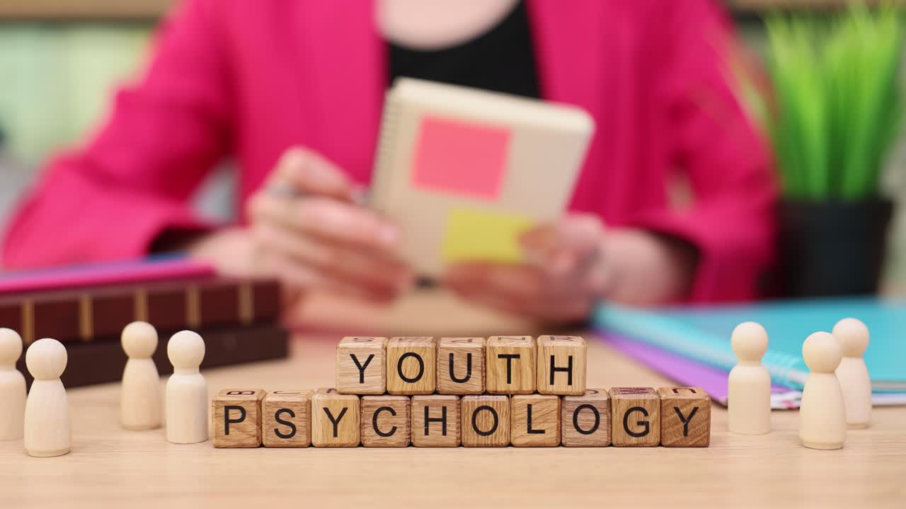 Youth Psychology Concept with Wooden Blocks