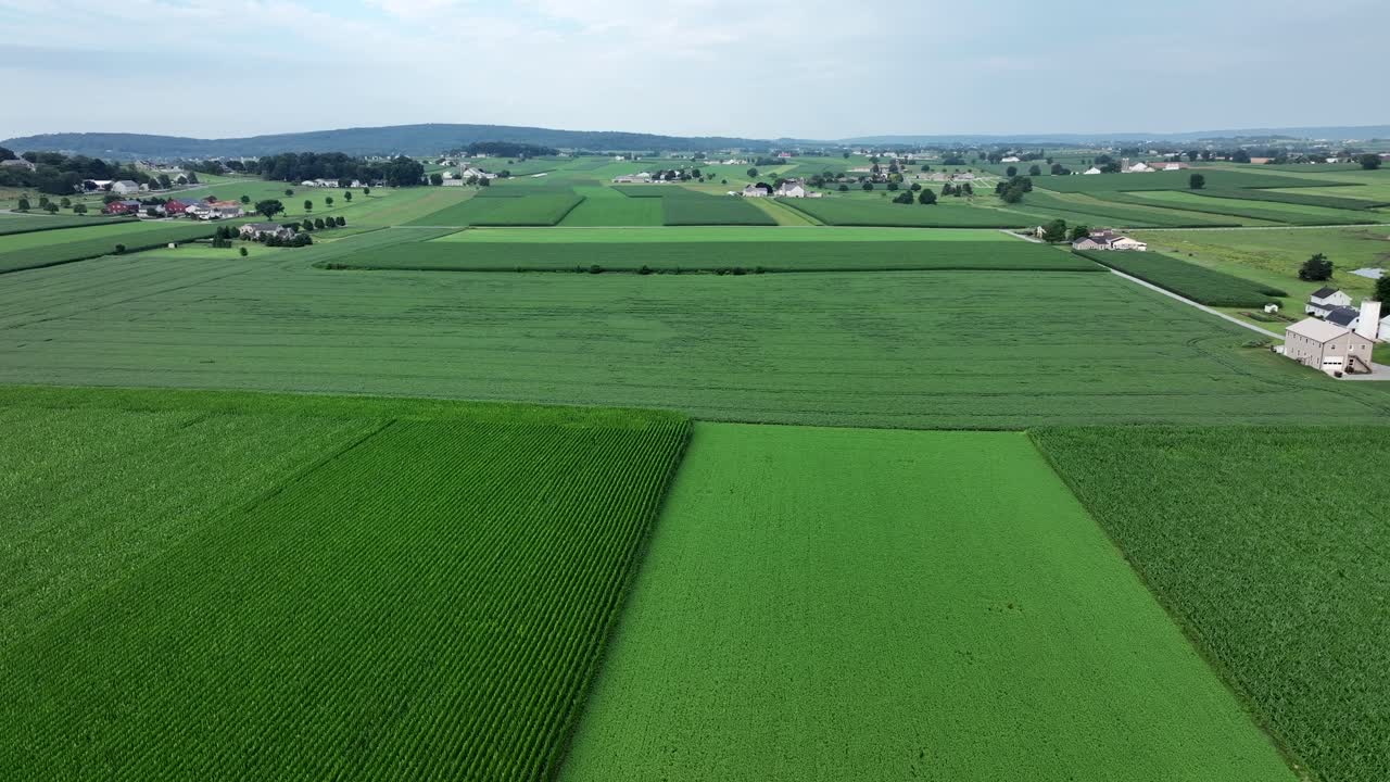 An aerial view of the lush green farmland of southern Lancaster County, Pennsylvania during the summer