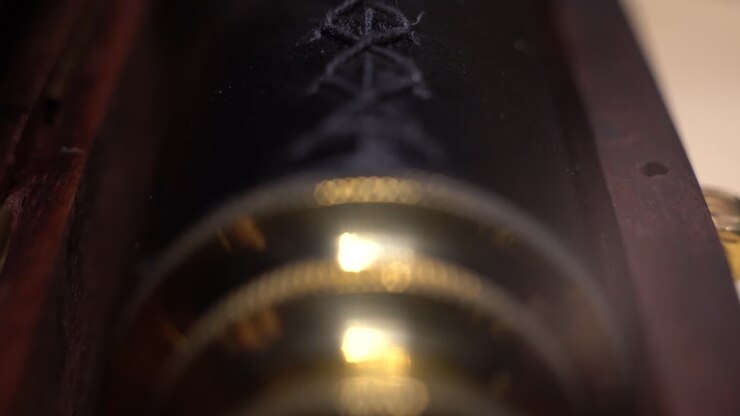 close shot of a monocular in a wooden box macro