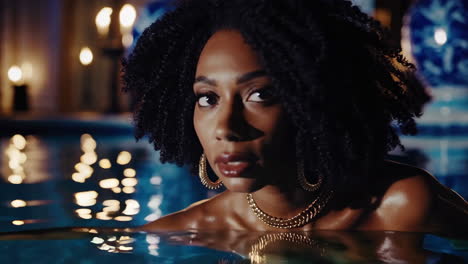 elegant woman in a pool at night