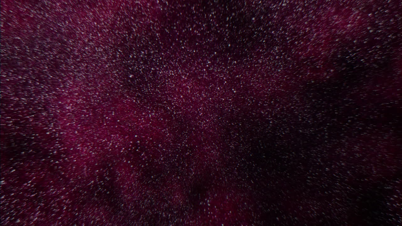 universo con polvo volador y nubes rojas