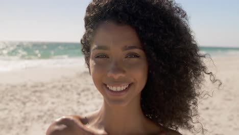 woman standing on the beach 4k
