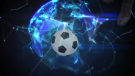 animation of globe and football over caucasian male soccer player