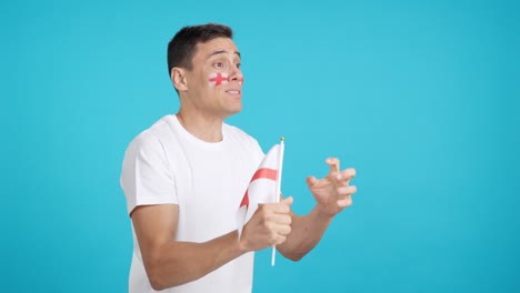 nervous english supporter during an exciting match looking away