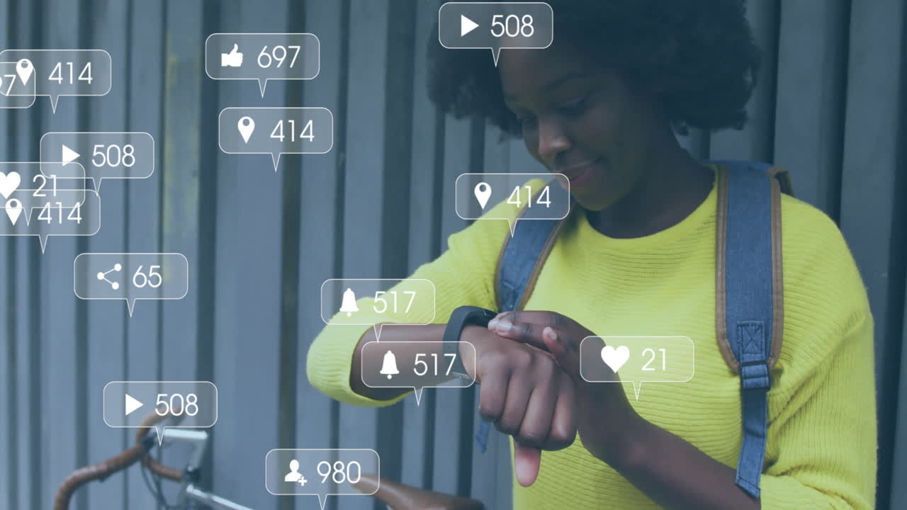 Animation of social media notifications over happy african american woman using smartwatch