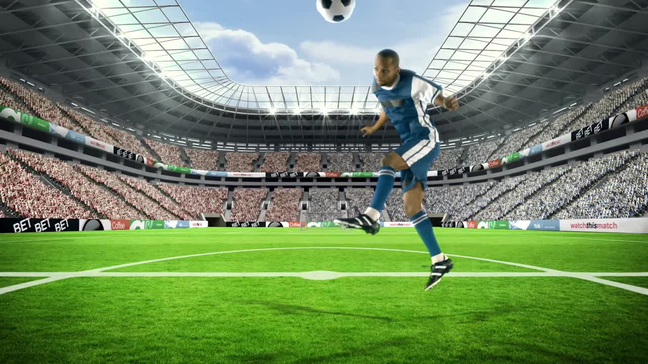 Football player kicking the ball with head