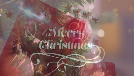 Animation-of-christmas-greetings-text-over-christmas-tree-and-decorations