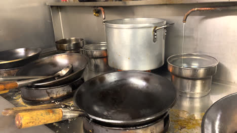 chinese takeaway restaurant, cooking stove,oven professional kitchen wok and flames