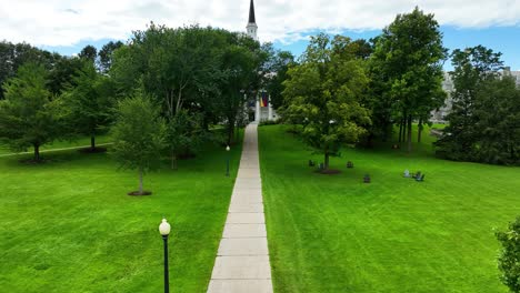 Hovering-over-lush-grasses-to-show-the-University