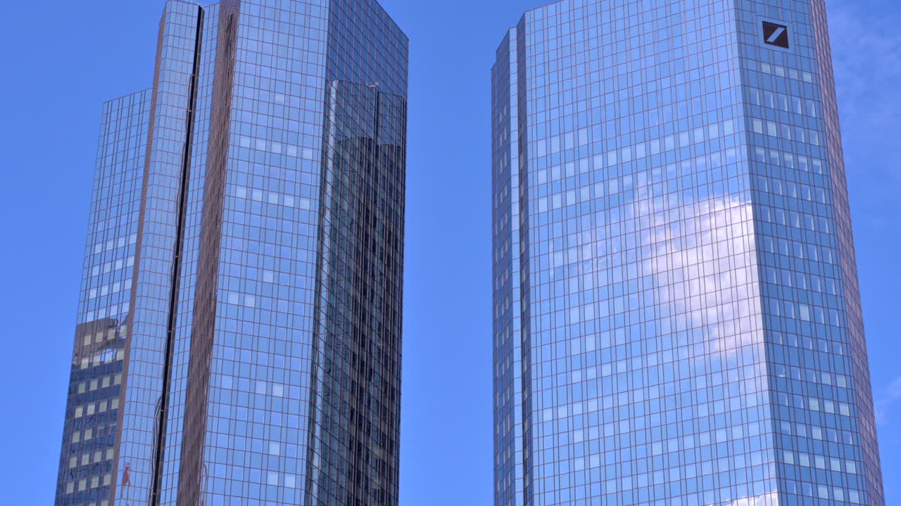 Frankfurt, Germany - November 13, 2022: Low angle view of the Deutsche Bank Twin Towers in Frankfurt, Germany
