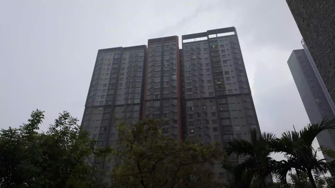 Static shot of apartment during heavy rain