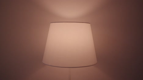 white table lamp in a room with soft lighting