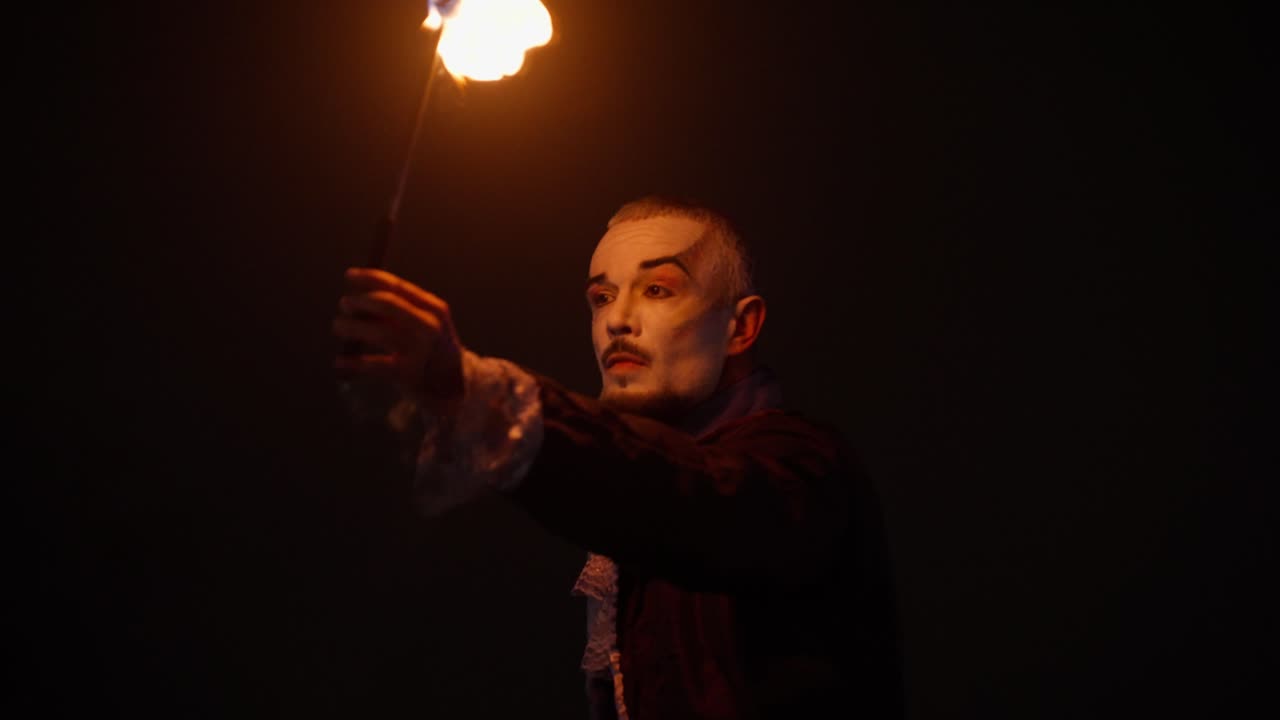 Cinematic night fire show with mystical, dramatic atmosphere outdoors